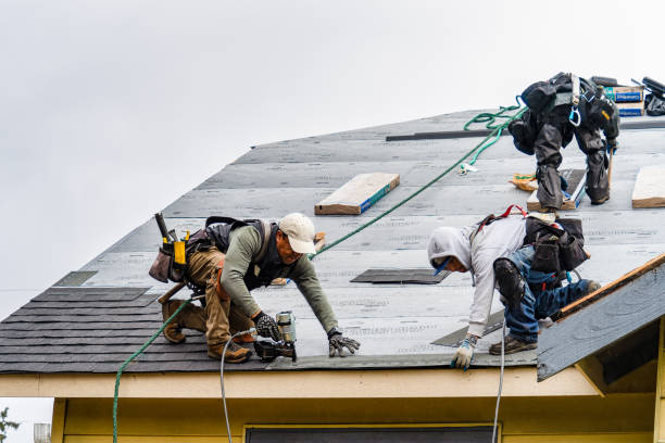 Professional Gutter Installation technician working in Le Grand, CA